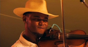 Cédric Watson and Bijou Creole performing at the Festival International de Louisiane in Lafayette